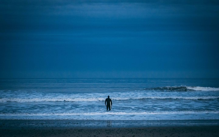 Surfer on Aberdeen Beach